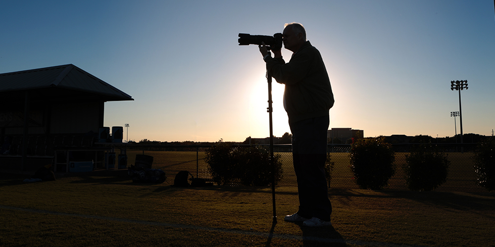 Doug Fejer shoots a photo.