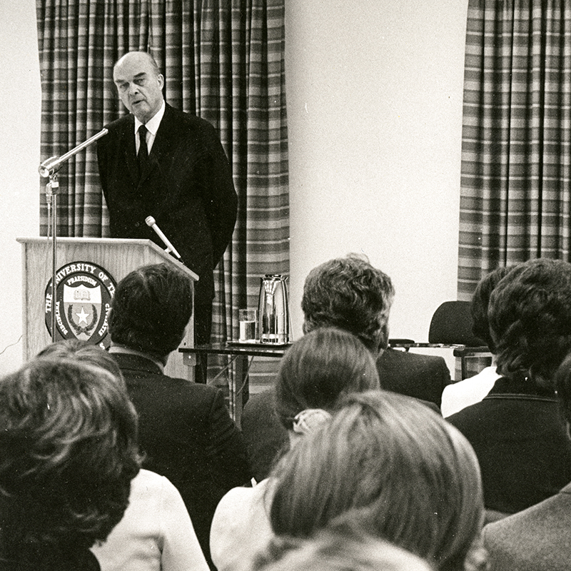 Photo of Jonsson standing at a lectern.