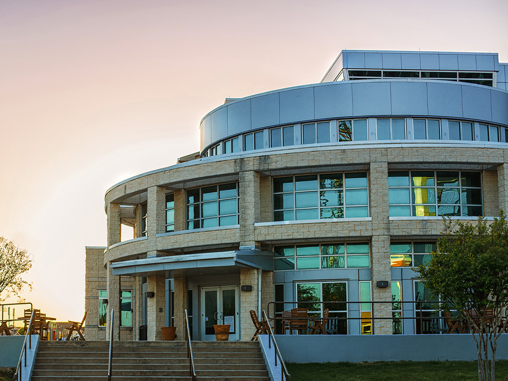 Campus residence hall as seen at dusk